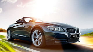 Black car driving road sky - a sky background and sun free wallpaper