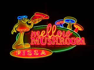 Mellow mushroom pizza neon sign - side of a building free wallpaper