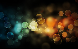 Blurry black background circles light 3 - circle of light free wallpaper