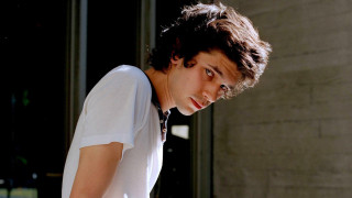 Young man white shirt tie - outside a building free wallpaper