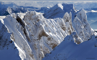 Snowy mountain range sky clouds - a few mountain free wallpaper