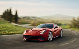 Red sports car driving countryside - road free wallpaper