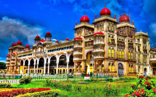 Large building red domes green 5 - a green lawn in front free wallpaper