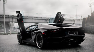 Black sports car parked side 2 - the side of the road free wallpaper