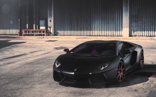 Black sports car parking lot 30 - a parking lot next free wallpaper
