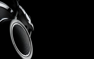 Headphones closeup black background white 2 - studio quality free wallpaper