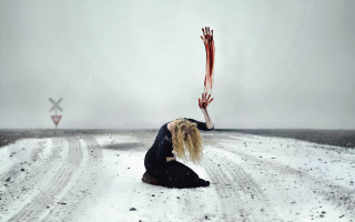 Woman kneeling snowy road holding - surreal photography free wallpaper