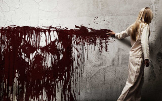 Woman bloodied wall red paint - a white wall behind her free wallpaper