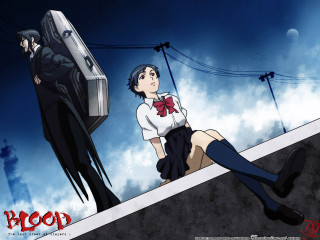 Woman sitting ledged man suit - a bat free wallpaper