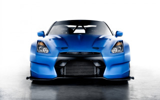 Blue sports car black hood - a white room free wallpaper