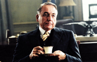 Man in suit holding coffee - david young cameron free wallpaper