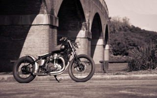 Motorcycle parked bridge road bush - cinematic photography free wallpaper