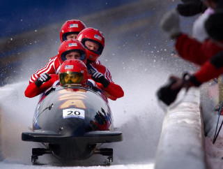 Sledding group snow slope skis - a group of people riding free wallpaper