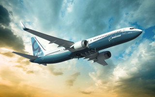 Large passenger jet cloudy sky 2 - a cloudy sky free wallpaper