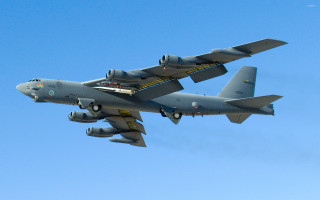 Military plane flying blue sky - ed benedict free wallpaper