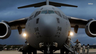 Large airplane people tarmac nighttime - the tarmac free wallpaper