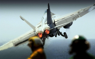 Fighter jet ocean man looking - action scene free wallpaper