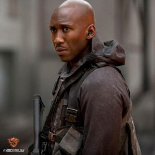 Man gun jacket street afrofuturism - a building in the background free wallpaper