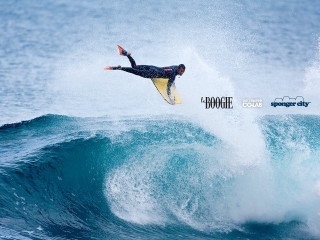 Man riding wave surfboard ocean 14 - top of a surfboard in the ocean free wallpaper