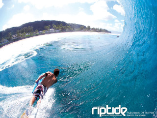 Surfing man wave ocean sunny - top of a surfboard in the ocean free wallpaper