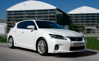 White car driving street building 4 - a street next free wallpaper