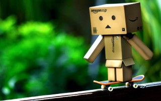 Cardboard toy skateboard ledge green - a ledge in front free wallpaper