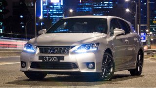 White car night city lights 5 - the side of a road free wallpaper