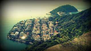 Village island ocean mountain water - a small island in the middle of the ocean free wallpaper