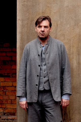 Man suit brick wall standing - david annand free wallpaper