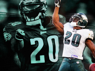 Football player holding ball background 4 - a football player holding free wallpaper