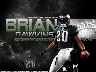 Football player holding ball dark - the back of the image free wallpaper