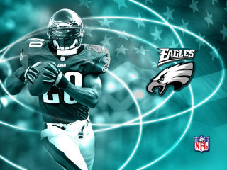 Football player running ball american - a football player running free wallpaper