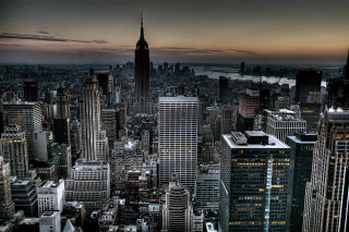 Cityscape tall buildings river sunset - tall building and a river in the background free wallpaper