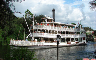 Large boat people river forest - a river next free wallpaper