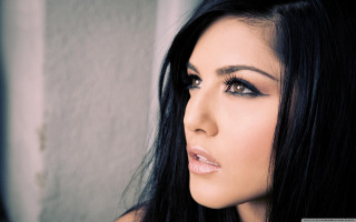 Woman black hair black dress 2 - a white wall free wallpaper