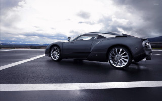 Black sports car parking lot 12 - matte finish free wallpaper