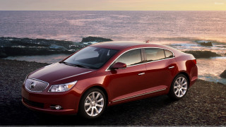 Red car rocky beach ocean - dave kendall free wallpaper
