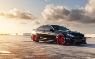 Black car red rims cloudy 2 - red rim free wallpaper
