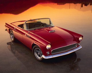 Red car parked water sunset - a reflection of the sky free wallpaper