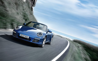 Blue porsche sports car cliff - a road next free wallpaper