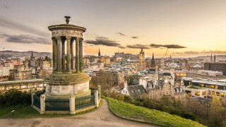 City clock tower bus view - a clock tower in the middle of it free wallpaper