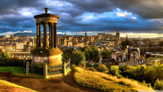 City tower cloudy sky dirtpath - alexander johnston free wallpaper