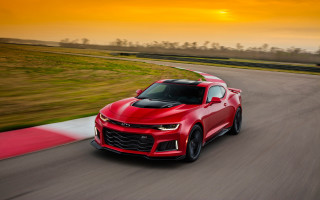 Red chevrolet camaro race track - sunset free wallpaper