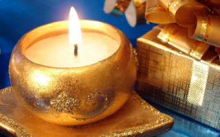 Candle lit golden bowl gift - a gift free wallpaper