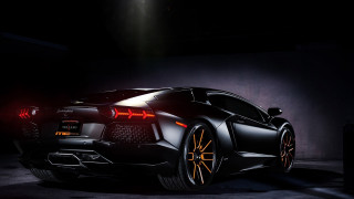 Black sports car dark room 23 - a spotlight free wallpaper