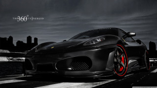 Black sports car red rims 7 - a city skyline free wallpaper