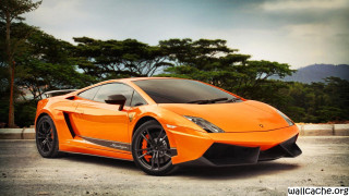Bright orange sports car parking 7 - cloudy free wallpaper
