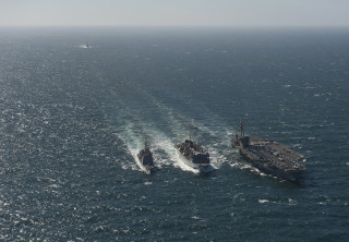 Two ships ocean background smaller 2 - a boat in the background free wallpaper
