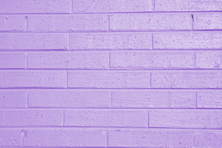 Purple brick wall white clock - a white clock free wallpaper