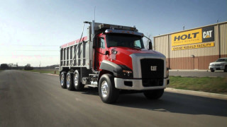 Red black truck driving street - carl hoppe free wallpaper